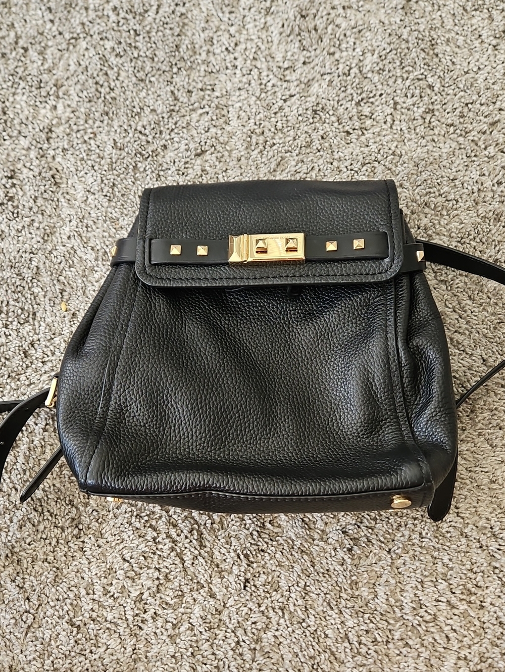 M8chael Kors Black Leather Backpack Purse with Gold Stud Detail